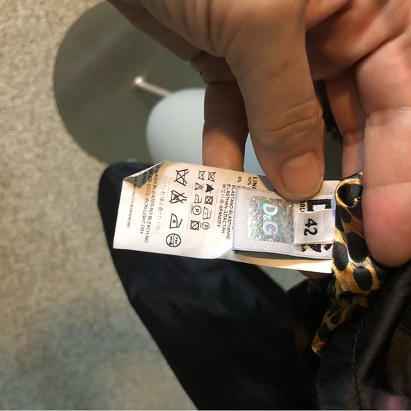 Authentic Dolce and Gabbana Short black shiny jacket with ruffle collar - Picture 13 of 13